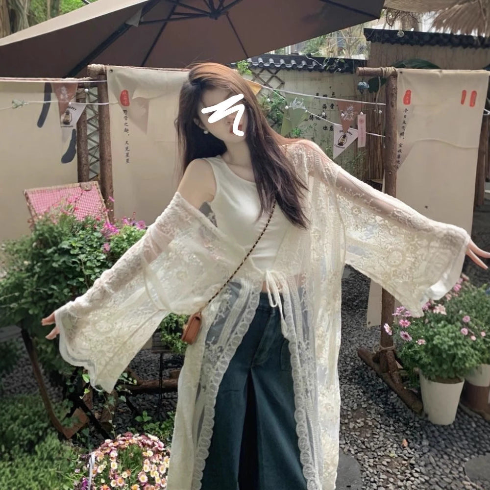 French-style crochet embroidered lace blouse for women, summer vacation style, thin sun protection jacket, loose long-sleeved cardigan, air-conditioned shirt.