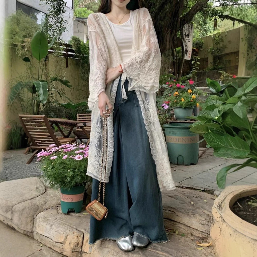 French-style crochet embroidered lace blouse for women, summer vacation style, thin sun protection jacket, loose long-sleeved cardigan, air-conditioned shirt.
