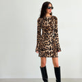 European and American sexy backless leopard print dress women's spring and summer retro lace-up slim basic wood ear decorative short skirt