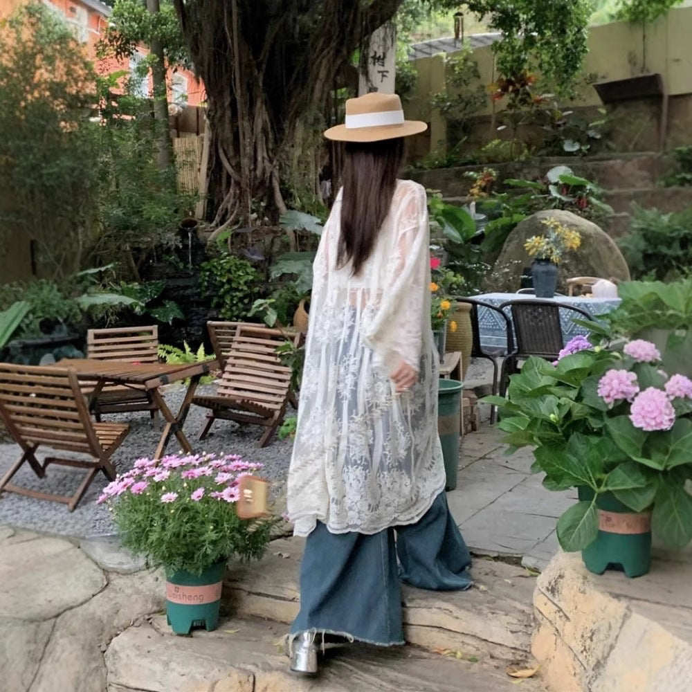 French-style crochet embroidered lace blouse for women, summer vacation style, thin sun protection jacket, loose long-sleeved cardigan, air-conditioned shirt.