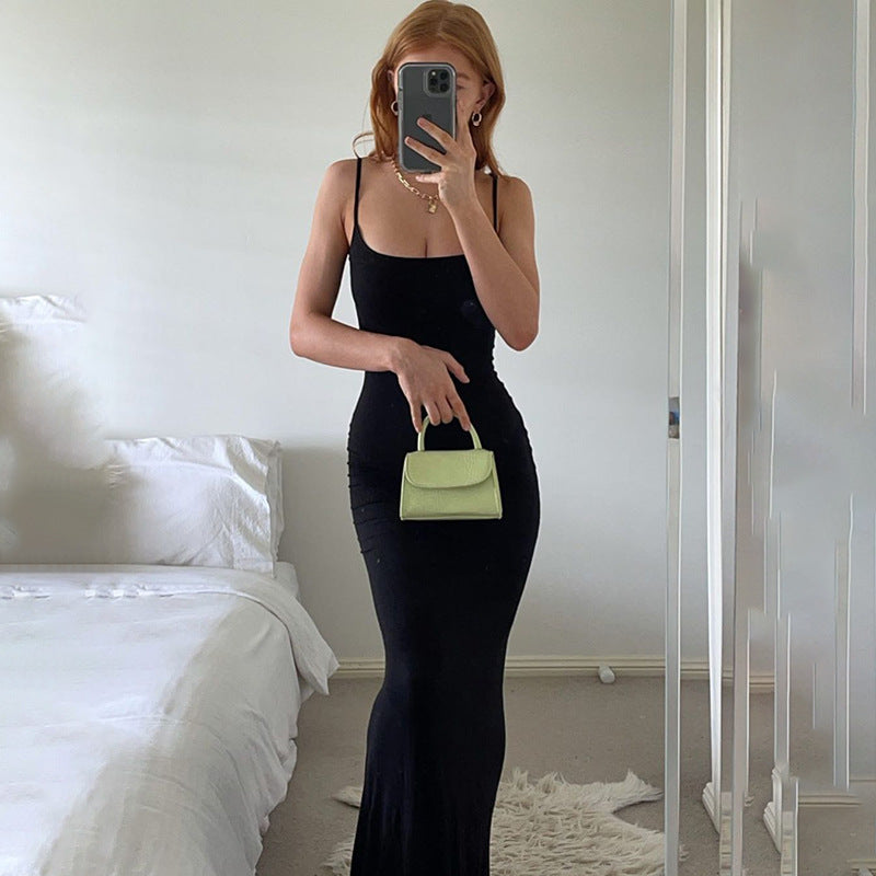 Suspender dress European and American women's clothing high-end pure desire style hip skirt sexy slim milk silk long fishtail skirt