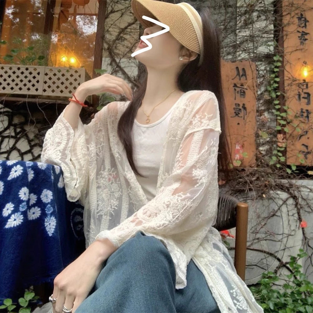 French-style crochet embroidered lace blouse for women, summer vacation style, thin sun protection jacket, loose long-sleeved cardigan, air-conditioned shirt.
