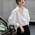 French-style women's shirt, 2026 spring and autumn, white top, new design, layering, niche style, long-sleeved, wrinkle-resistant shirt.