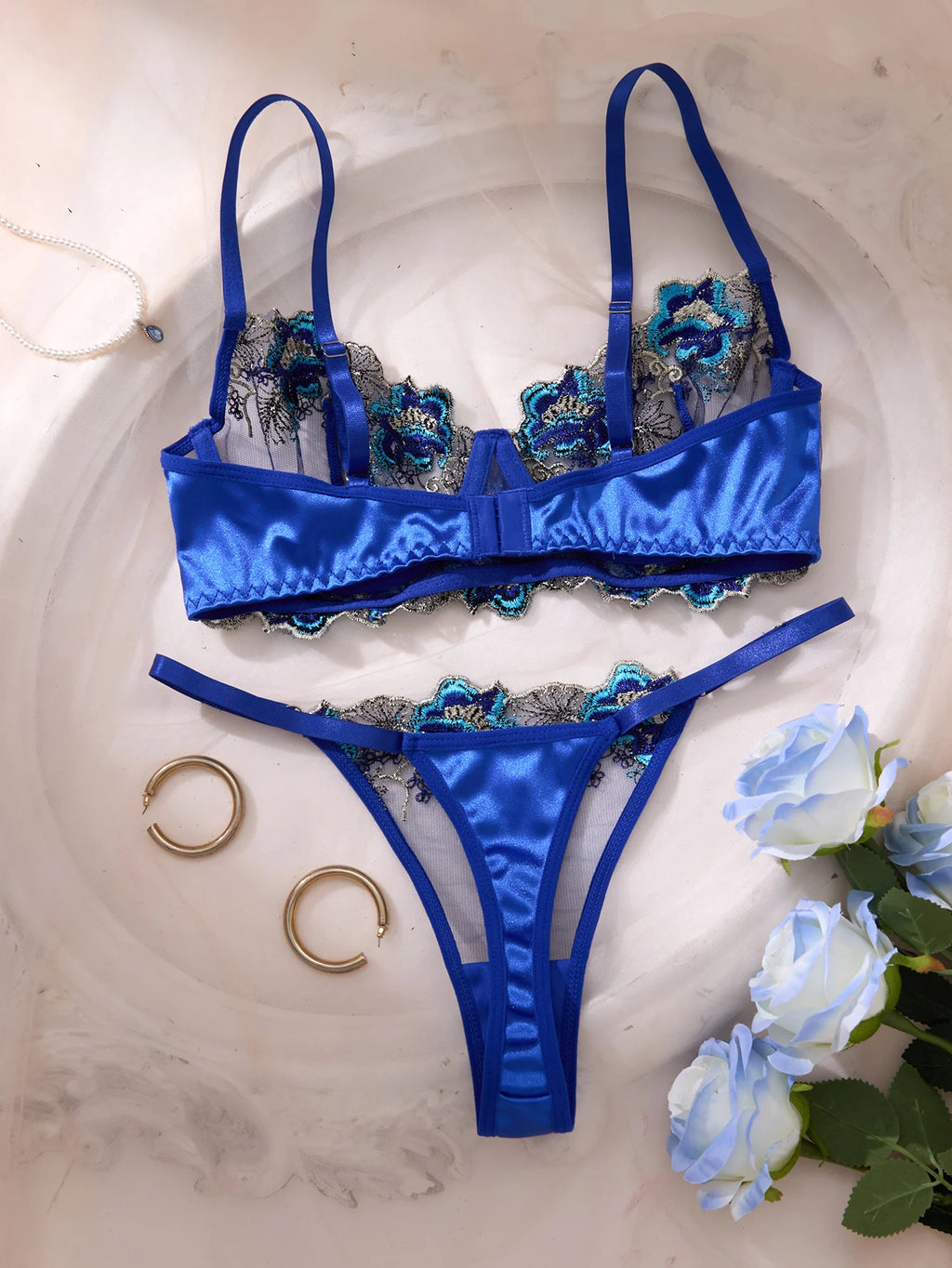 A set of sexy blue lingerie, featuring floral patterns, combining charm and sexiness ZA825146